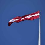 Lotyšská vláda je pripravená začať pracovať na národnom postavení pre jadrovú energetiku Lotyšsko, lotyšská vlajka